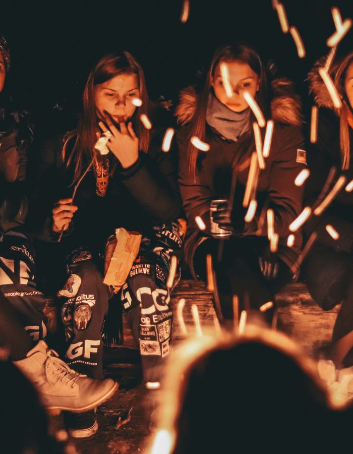 A group of friends at night